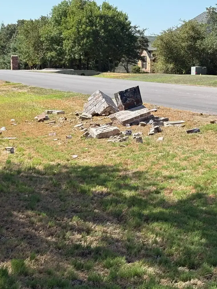 Smashed brick mailbox before a mailbox repair in Hudson Oaks